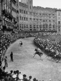 People Watching Horse Race that Is Traditional Part of the Palio Celebration Photographic Print by Walter Sanders