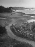 Two Golfers Playing on a Putting Green at Pebble Beach Golf Course Photographic Print by Nina Leen