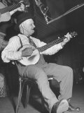 Man Playing the Banjo Onstage at the Grand Ole Opry Photographic Print by Ed Clark