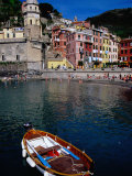 Brightly Coloured Buildings of Cinque Terre with Rowboat in Foreground, Vernazza, Italy Photographic Print by Glenn Beanland