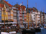 Yachts Moored in Front of Cafes at Nyhavn, Copenhagen, Denmark Photographic Print by Holger Leue