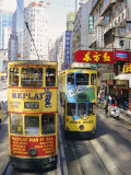 Trams in Wan Chai (Wanchai), Hong Kong, China Photographic Print by Charles Bowman