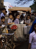 Schoolchildren in Cycle Rickshaw, Aleppey, Kerala State, India Photographic Print by Jenny Pate