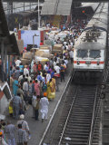 Train Ariving at Crowded Platform in New Delhi Train Station, Delhi, India Photographic Print by Eitan Simanor