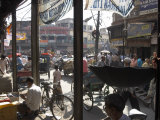 People and Vehicles in the Spice Market, Chandni Chowk Bazaar, Old Delhi, Delhi, India Photographic Print by Eitan Simanor