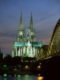 Cologne Cathedral, and Hohenzollern Bridge at Night, North Rhine Westphalia Photographic Print by Yadid Levy