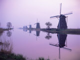 Windmills in Early Morning Mist, Kinderdijk, Unesco World Heritage Site, Holland Photographic Print by I Vanderharst