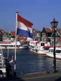 Raising the Dutch Flag by the Harbour, Volendam, Ijsselmeer, Holland Photographic Print by I Vanderharst