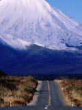 Road Leading Up to Snow-Covered Mount Ngauruhoe, Tongariro National Park, New Zealand Photographic Print by Oliver Strewe