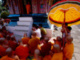 Buddhist Monks at Wat Xiengthong, Lunar New Year, Luang Prabang, Laos Photographic Print by Alain Evrard