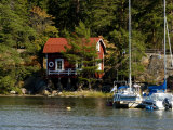 Vacation Home and Boats on Island in Helsinki harbor, Helsinki, Finland Photographic Print by Nancy & Steve Ross