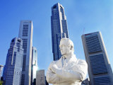 A Statue of Sir Stamford Raffles Against the Cityscape of Singapore Photographic Print by Eightfish 