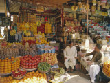 Fruit and Basketware Stalls in the Market, Karachi, Pakistan Photographic Print by Robert Harding