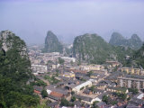 Limestone Towers in the City of Guilin, Guangxi Province, China Photographic Print by Anthony Waltham