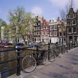 Bicycles on a Bridge Across the Canal at Herengracht in Amsterdam, Holland Photographic Print by Roy Rainford