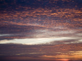 Blue and Orange Clouds During North Carolina Coast Sunset Photographic Print by David Evans