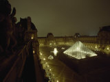 The Pyramid Glows at Night in the Cour Napoleon III at the Louvre, France Photographic Print by James L. Stanfield