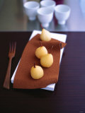 Poached Pears on Chocolate Leaf Photographic Print by David Loftus
