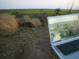 Laptop Computer in the Veld, Northern Tuli Game Reserve, Botswana Photographic Print by Roger De La Harpe