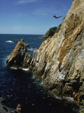 Man Cliff Diving, Acapulco, Mexico Photographic Print by Curt Shields