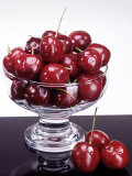 Cherries in a Glass Bowl on Granite Photographic Print by Eric Kamp