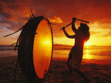 Native Hawaiian Man Beats His Drum on Makena Beach at Sunset Photographic Print by Mark Cosslett