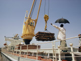 Unloading Freight from a Ship Docked in Khulna Photographic Print by Dick Durrance