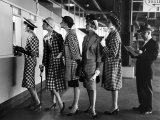 5 Models Wearing Fashionable Dress Suits at a Race Track Betting Window, at Roosevelt Raceway Photographic Print by Nina Leen