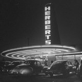 Cars Sitting Outside of a Drive in Restaurant Photographic Print by Nina Leen