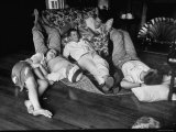 Busiest Hostess Lina McCarroll, and Group of Her Guests, Collapsing Happily 7:30 on Sunday Morning Photographic Print by Lisa Larsen