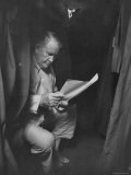 Vice President Alben Barley Sitting in Lower Sleeping Car Birth on a Train as He Studies His Speech Photographic Print by Lisa Larsen