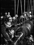 TVA Workers Installing Huge Generator at World's Largest Coal Fueled Steam Plant Photographic Print by Margaret Bourke-White