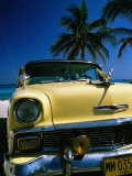 Old Yellow Chevrolet, Parked by the Ocean, Varadero, Matanzas, Cuba Photographic Print by Martin Lladó