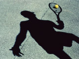 Shadow of a Male Tennis Player Playing Tennis Photographic Print