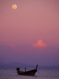 Full Moon and Sunset Behind Fishing Boat, Phi Phi Island, Thailand Photographic Print by Claudia Adams