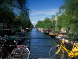 Yellow Bicycle and Canal, Amsterdam, Netherlands Photographic Print by Nik Wheeler