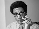Comedian Bill Cosby Holding Cigar Premium Photographic Print by Alfred Eisenstaedt