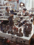 Designers Charles Eames and Wife Ray Eames Filming Toy Trains at Their Studio, Photographic Print