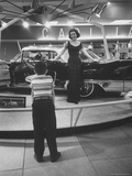 Model Posing Beside Cadillac Eldorado Captures Attention of Young Boy at National Automobile Show Photographic Print by Walter Sanders