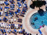 Overhead of Poolside Sunbathers, Treasure Island Hotel, Las Vegas, U.S.A. Photographic Print by James Marshall