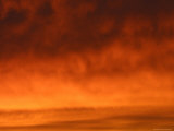 Orange Fluffy Clouds at Sunset, Photographic Print