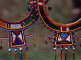 Traditional Maasai Jewellery at the Craft Market Near Rekero, Rift Valley, Kenya Photographic Print by Tom Cockrem