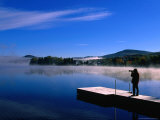 Photographer on Pier of Lake Superior Near Mount Tremblant, Quebec, Canada Photographic Print by Alain Evrard