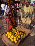 Women with Wheelbarrow of Lemons at Local Market, Djibouti, Djibouti Photographic Print by Mason Florence