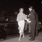 Lauren Bacall is Helped out of Her Car at the Royal Film Show, February 1959 Photographie