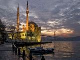 Ortakoy Mosque Looking Towards the Bosphorus Bridge, under a Cloudy Sky Photographic Print by Izzet Keribar