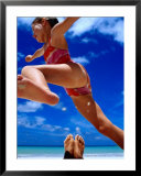 Girl Jumping Dad's Legs, Seychelles  Prints by Philip Smith