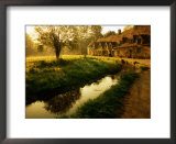 Morning Mist on Rack Isle Outside Weavers' Cottages, Arlington Row, Bibury, United Kingdom Posters by Barbara Van Zanten