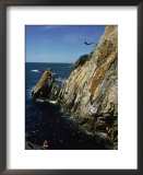Man cliff diving, Acapulco, Mexico Posters by Curt Shields