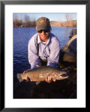 Portrait Of A Flyfisherman Holding His Catch  Prints by Larry Stanley